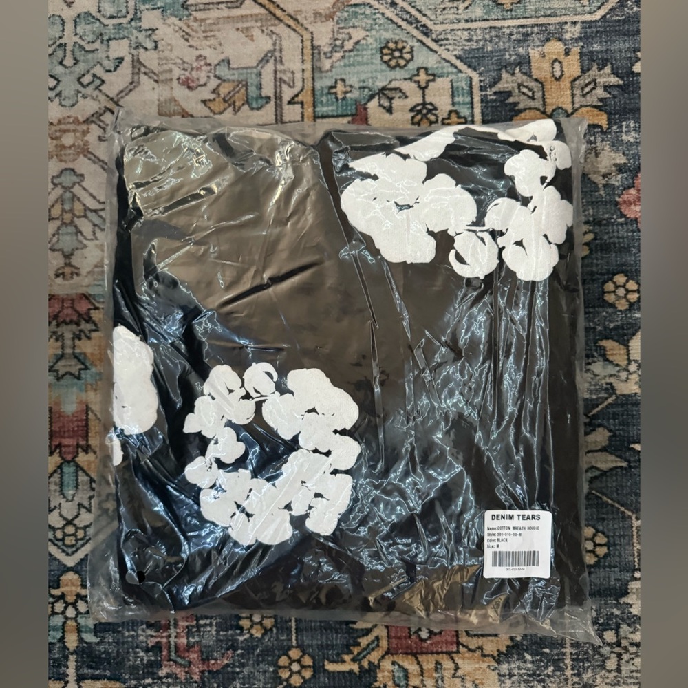 Black denim tears hoodie 
Size M